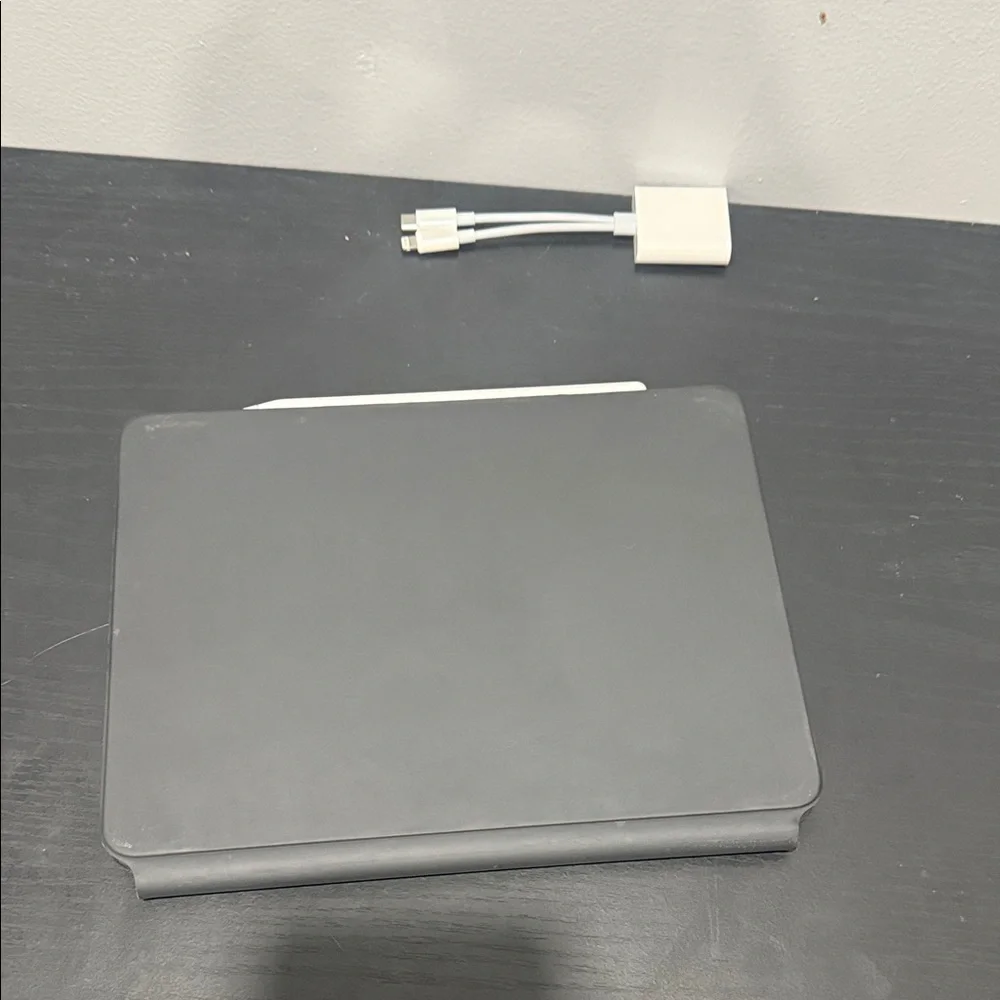 iPad Air with Apple Pencil(new) and Apple Smart Folio Case. Everything works.